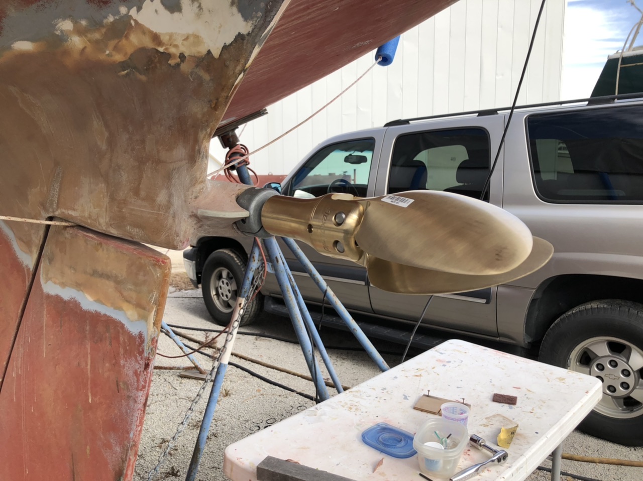 Prop closed for sailing. Note the little tab I epoxied on to left side of trailing edge of the shaft log to reduce turbulence.