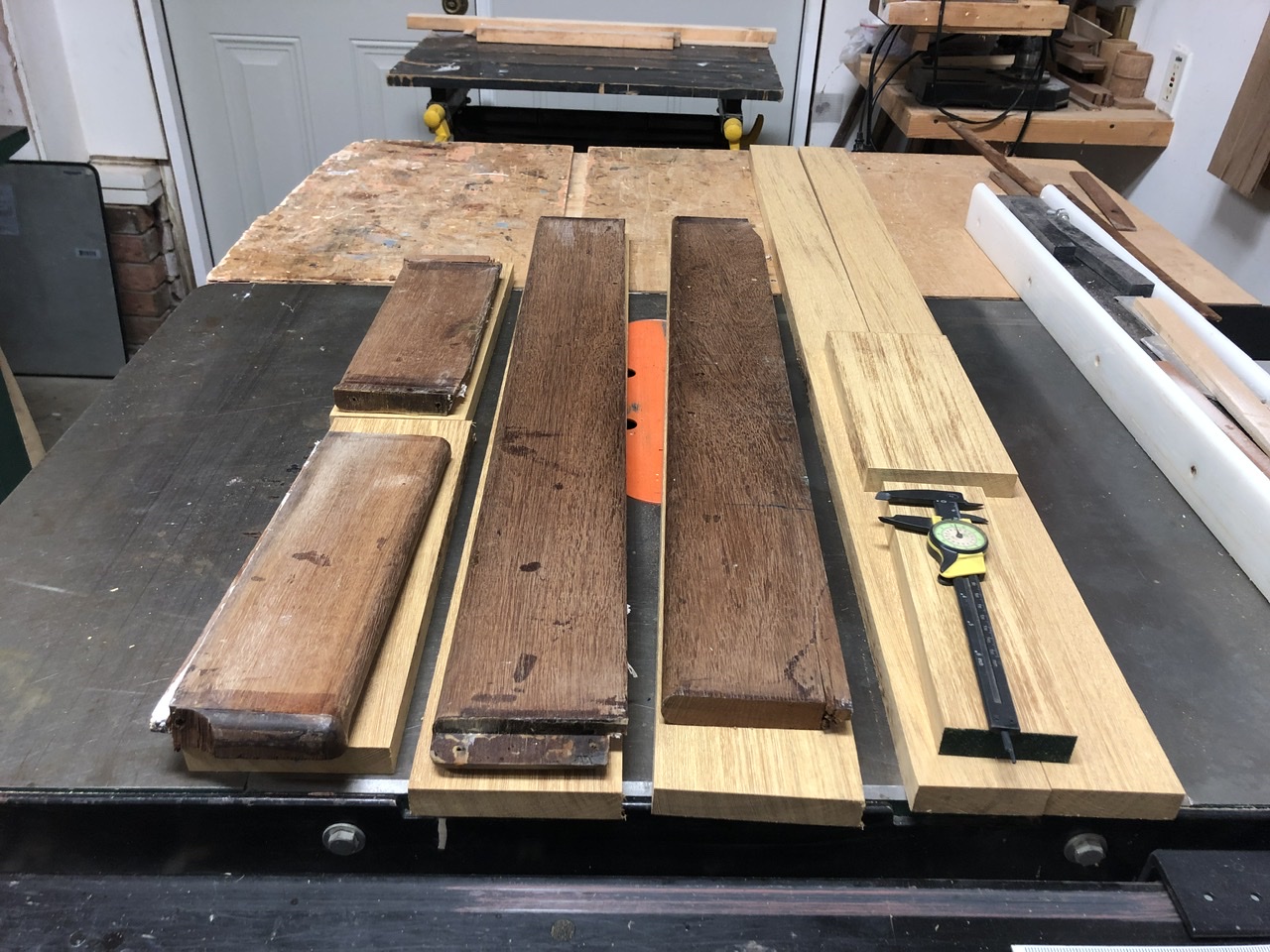 In this photo you can see how the new pieces line up with the old ones. I cut the parts a little long and a quarter inch wider than the final product.