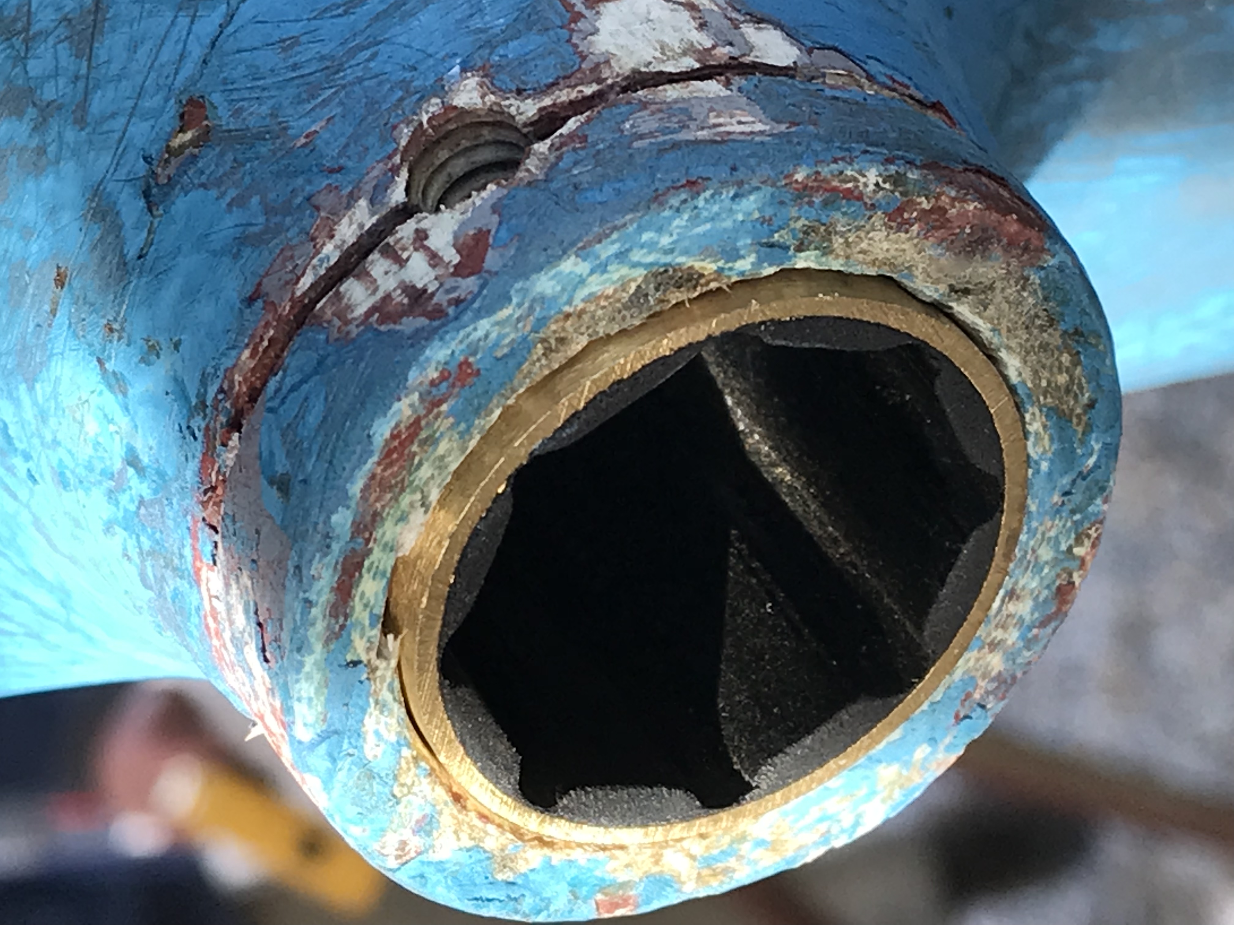 The replacement cutlass bearing in place waiting to be dimpled before the set screws were tightened.