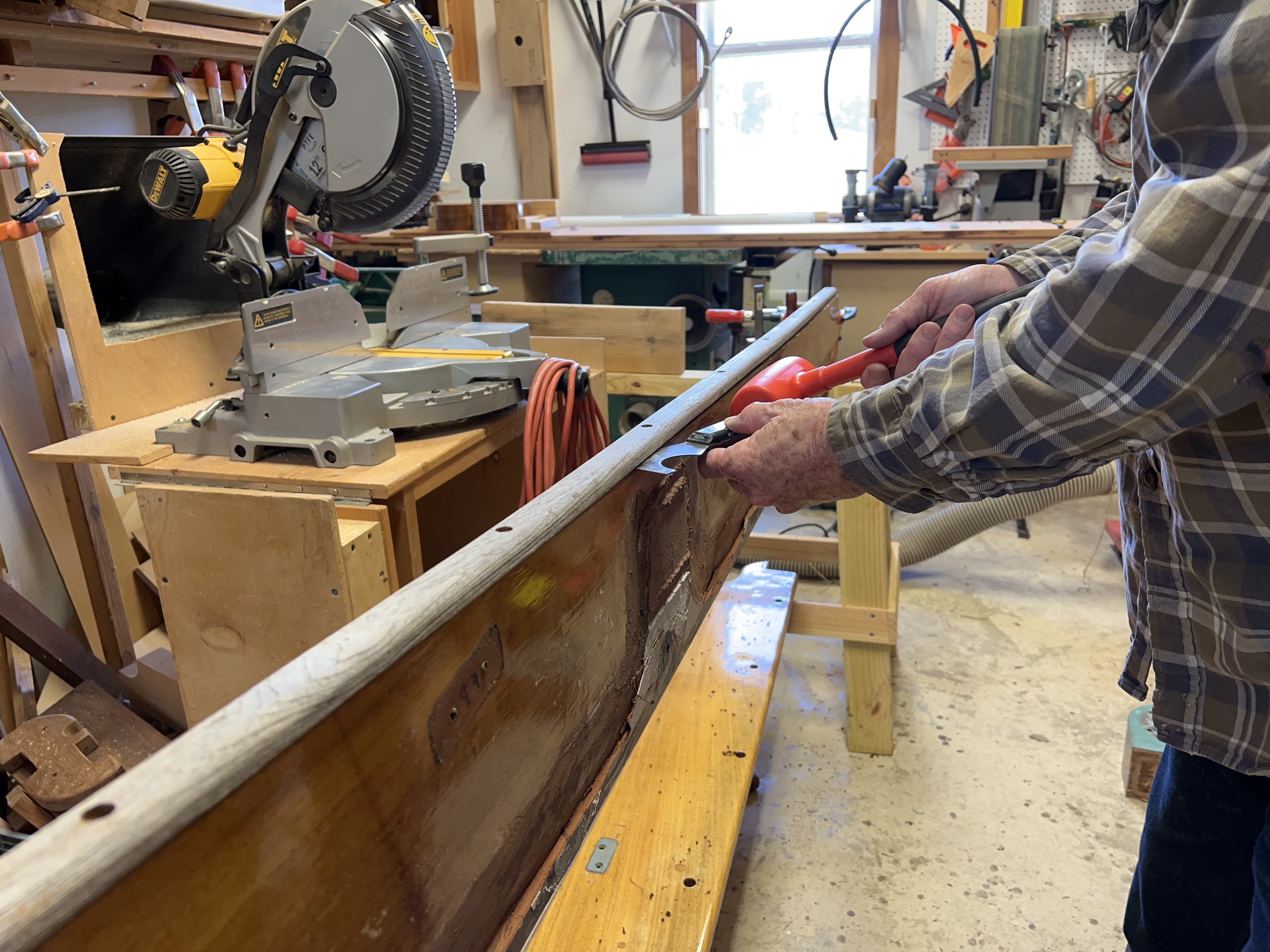 Removing the teak cap rail.