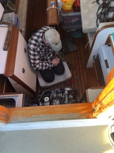 First mate straightening the coolant pulley (offshore!)