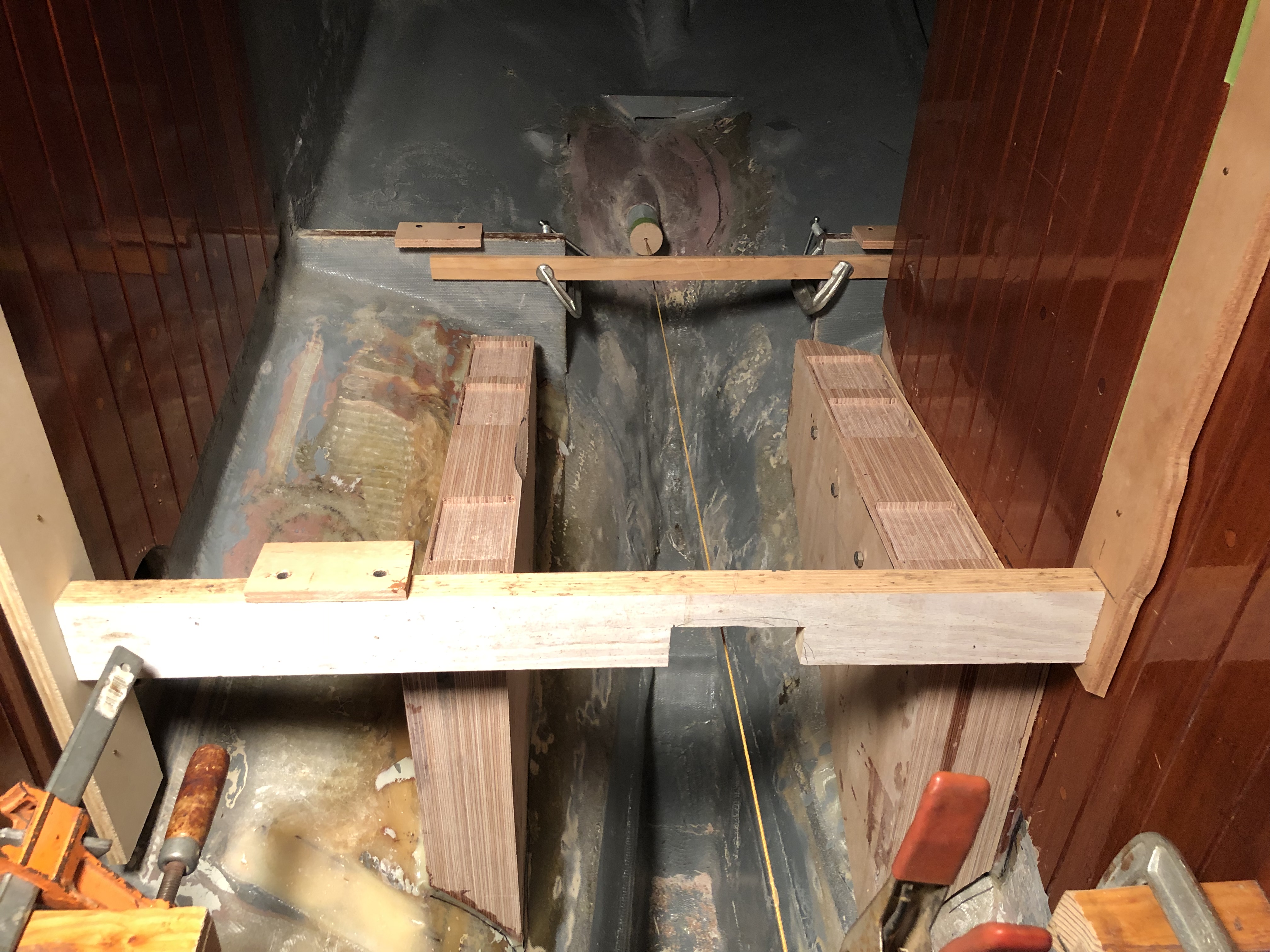 The two beds. Starboard side is epoxied in place. Port bed is temporarily bolted in place.  Both will eventually be covered with four layers of biaxial.