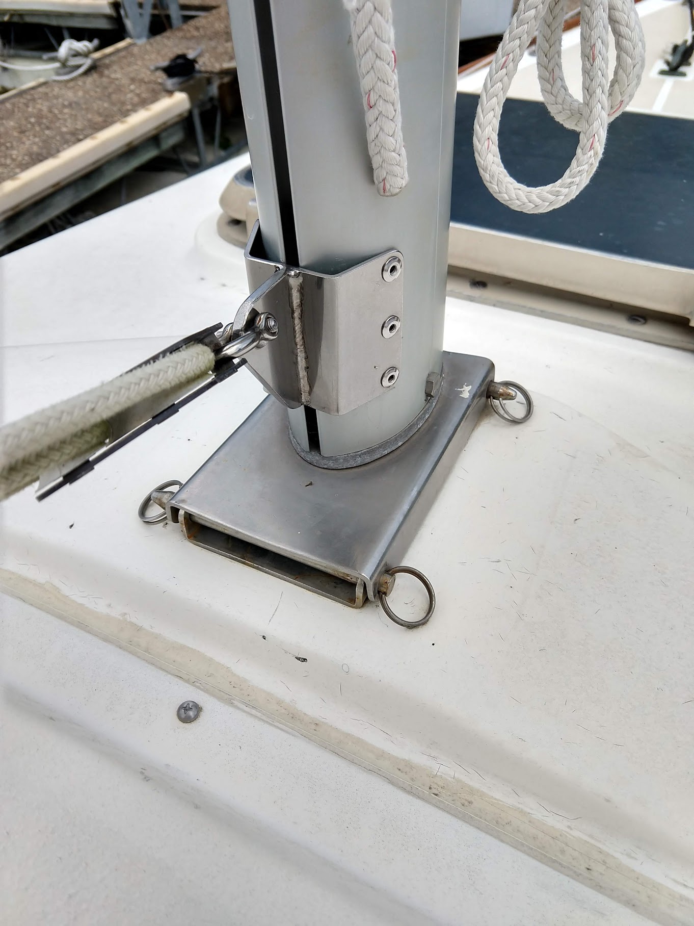 Starboard view of mast base on collar and hinge plate