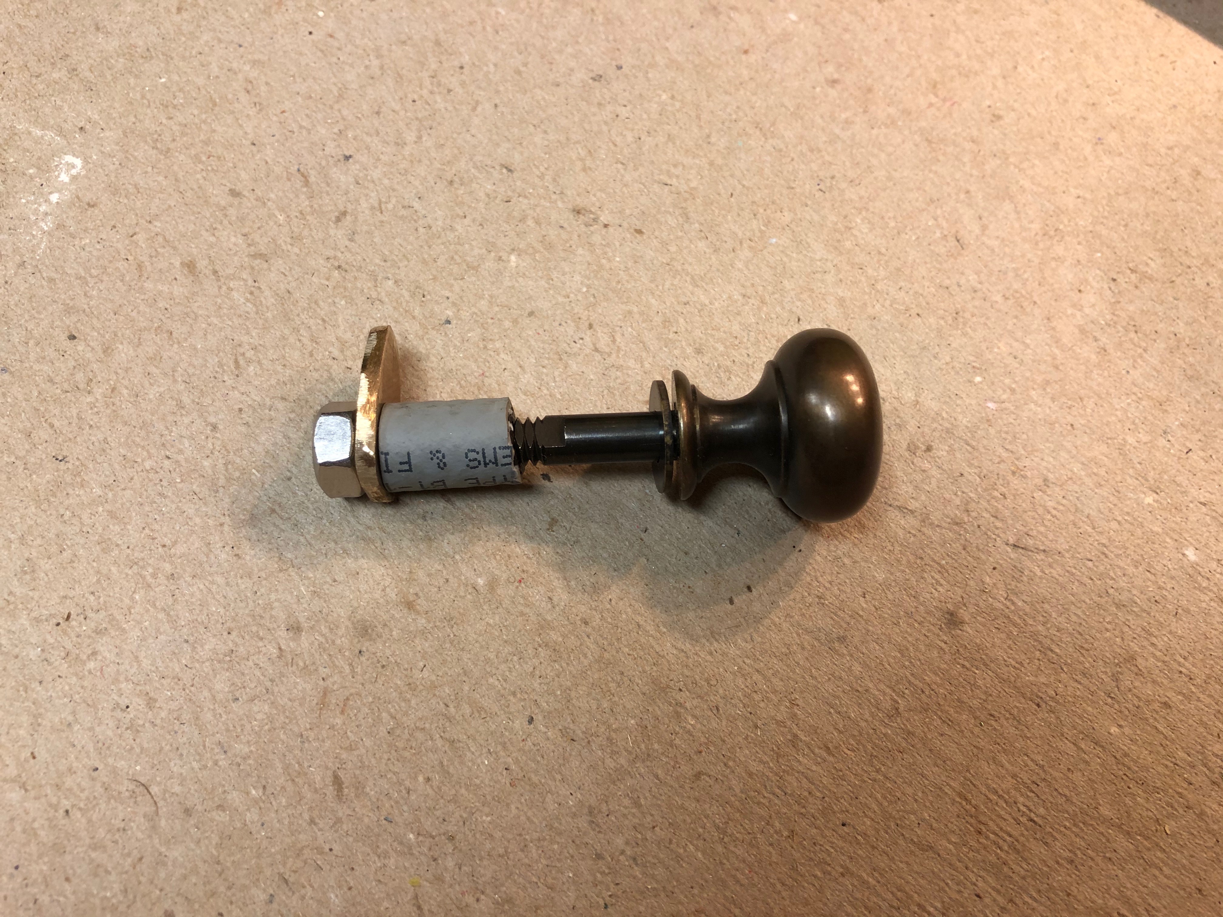 I fabricated a short latch from 1/8” silicon bronze.